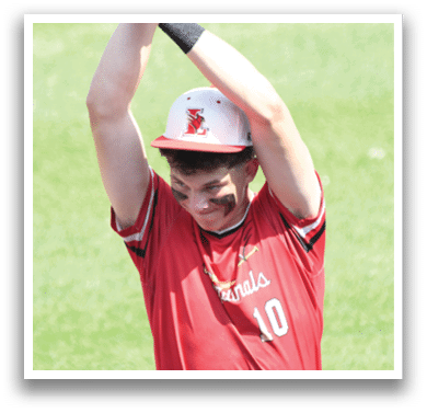 A baseball player wearing a red shirt with the number 10 on it. Description generated by AI