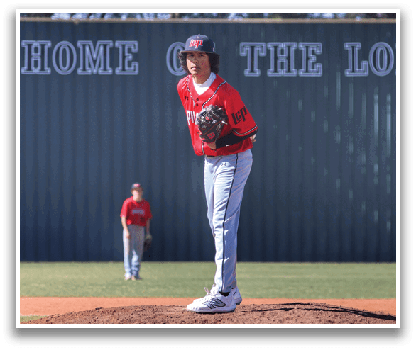 A baseball player in a red jersey is on the mound, preparing to throw the ball. AI generated content