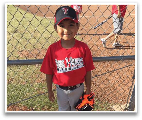 A young boy wearing a baseball uniform and holding a mitt. AI generated content