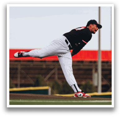 A baseball player in a black shirt and white pants is throwing a ball. AI generated content