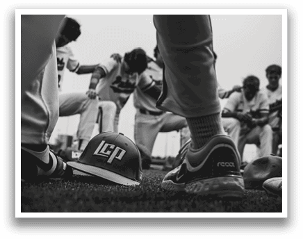 A baseball player is bending over to pick up his hat. AI generated content