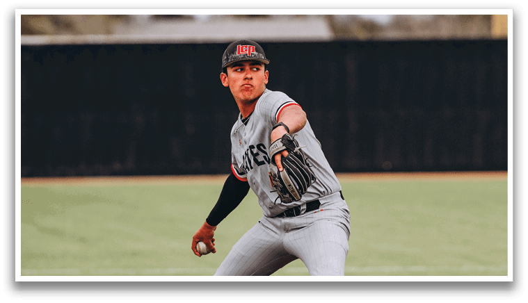 A baseball player in a grey uniform is on the pitcher's mound, holding a baseball glove and preparing to throw the ball. AI generated content
