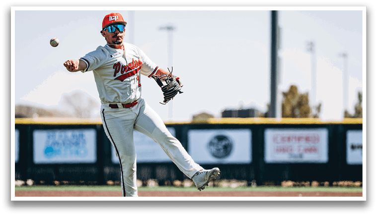 A baseball player in a white uniform is leaping in the air to catch a ball. AI generated content