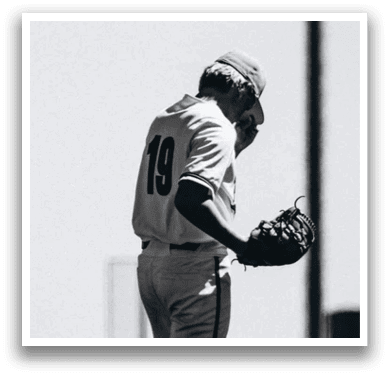 A baseball player is standing on the pitcher's mound, holding a baseball glove. AI generated content