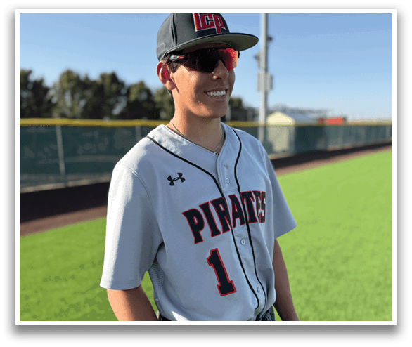 A young man wearing a Pirates jersey and sunglasses poses for a picture. AI generated content