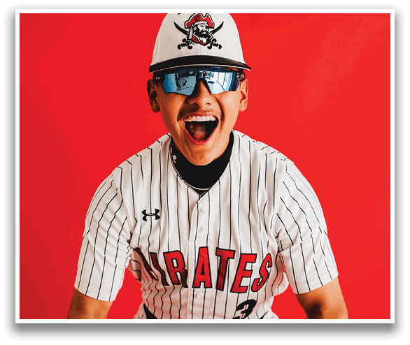 A man wearing a Pirates jersey and sunglasses. Description generated by AI