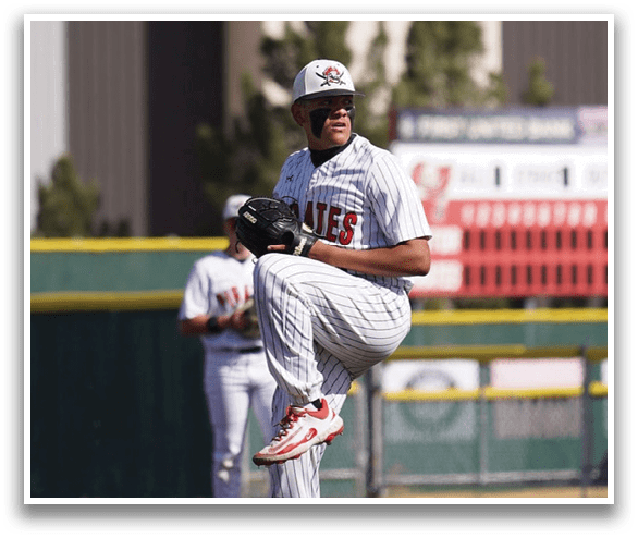 A baseball player in a white shirt and red shoes is pitching a ball. Description generated by AI