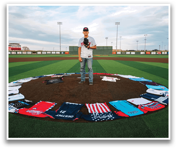 A circle of shirts on a baseball field. Description generated by AI