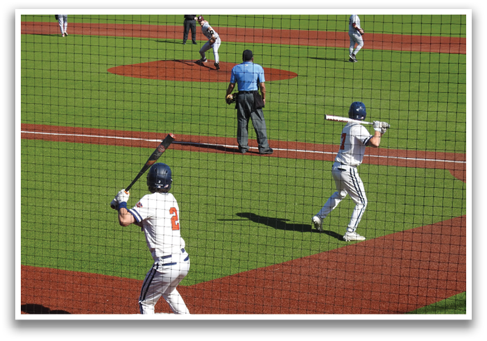 A baseball player is swinging a bat at a ball. Contenido generado con IA