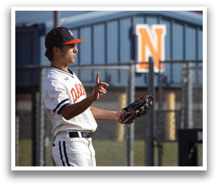 A baseball player in a white uniform is standing on the field, holding a baseball glove. Contenido generado con IA