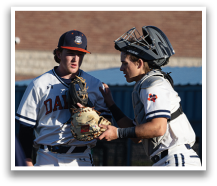 Two baseball players are standing on the field, one of them holding a baseball glove. Contenido generado con IA