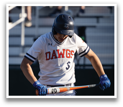 A baseball player is walking across the field with a bat in his hand. Contenido generado con IA