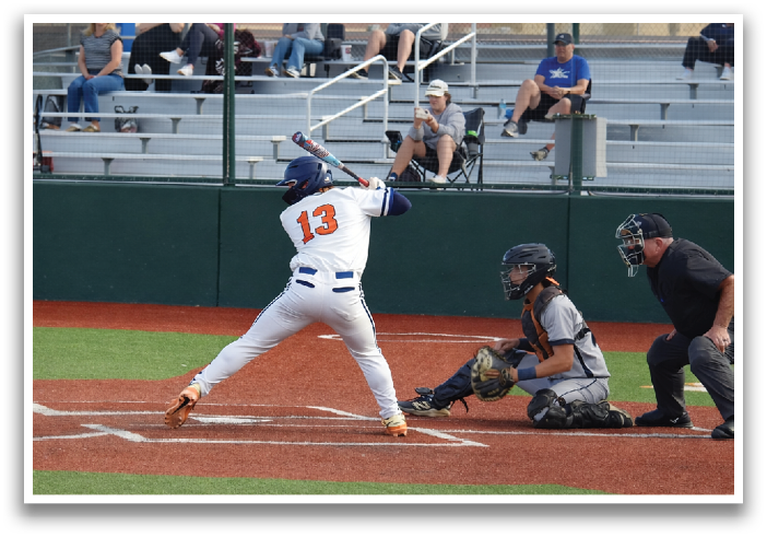 A baseball player is swinging a bat at a ball during a game. Contenido generado con IA