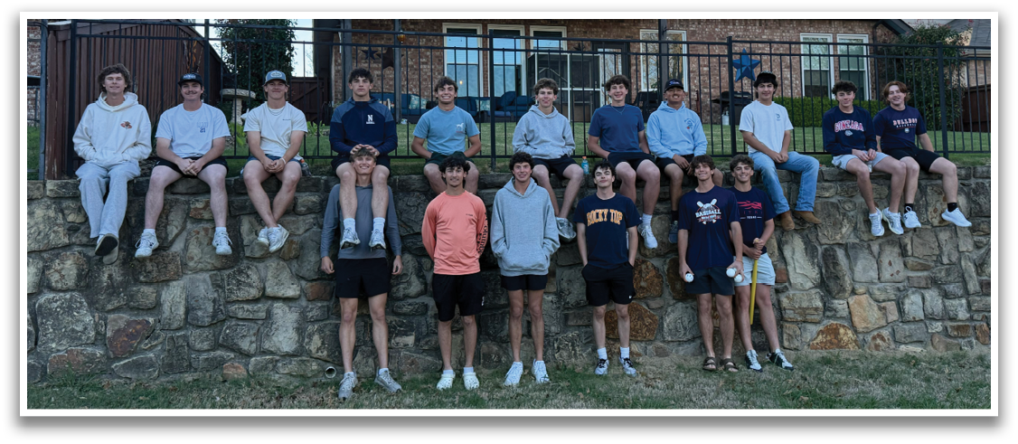 A group of young men and women are posing for a picture in front of a brick wall. Contenido generado con IA