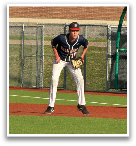 A baseball player in a blue and orange uniform is standing on a baseball field, holding a baseball glove. Contenido generado con IA