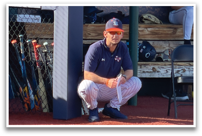 A man is sitting on a bench with his legs up, wearing a baseball uniform. Contenido generado con IA