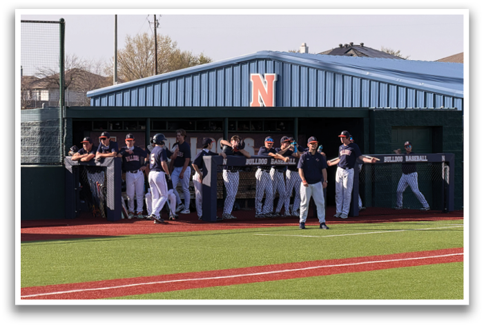 A group of baseball players are standing on a baseball field, some of them are wearing helmets. Contenido generado con IA