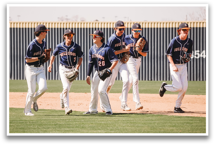 A group of baseball players wearing blue uniforms and holding baseball gloves. Contenido generado con IA