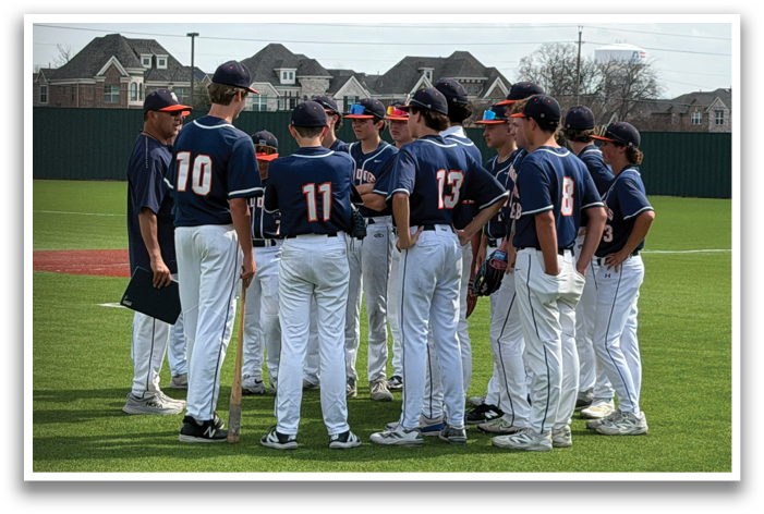 A group of baseball players wearing blue uniforms and white pants are standing on a field. Contenido generado con IA