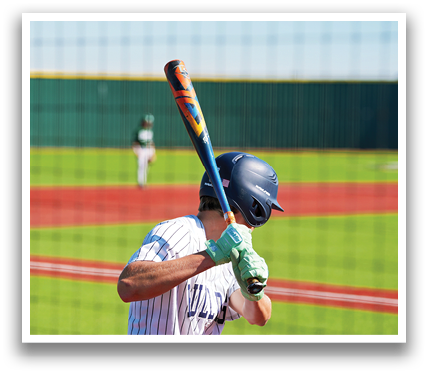 A baseball player is swinging a bat on a field. Contenido generado con IA