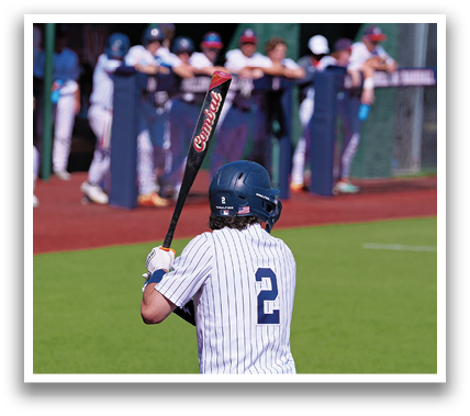 A baseball player is swinging a bat on a field. Contenido generado con IA