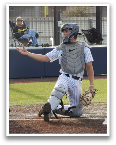 A baseball player is holding a bat, ready to swing. Contenido generado con IA