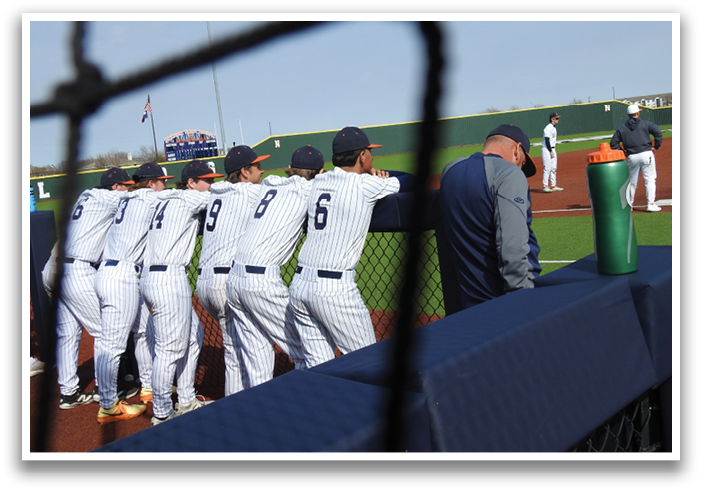 Baseball players in uniforms sitting on the ground. Contenido generado con IA