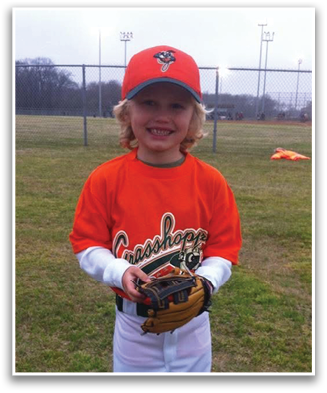 A young boy wearing a baseball uniform and a catcher's mitt. Contenido generado con IA