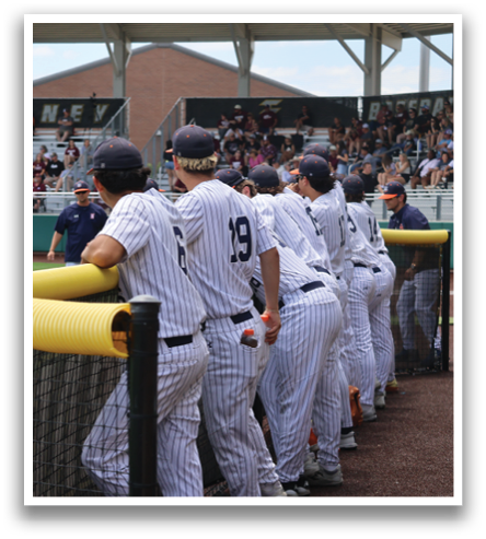 Baseball players in uniforms are lined up on the field, waiting for the game to start. Contenido generado con IA