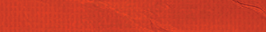 A red piece of paper with a wrinkled texture. Contenido generado con IA