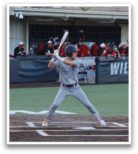 A baseball player is swinging a bat on a field. Contenido generado con IA