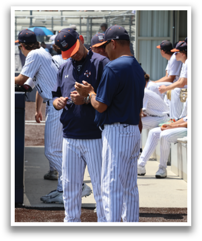 Baseball players wearing blue and white uniforms are standing on a field. Contenido generado con IA