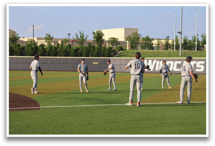 A group of baseball players are standing on a field, some of them wearing baseball gloves. Contenido generado con IA