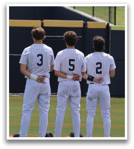 Four baseball players standing on a field, wearing white uniforms and holding baseball bats. Contenido generado con IA