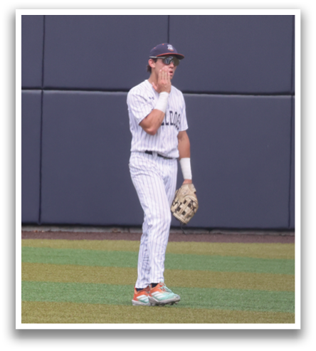 A baseball player stands on the field, holding a baseball glove. Contenido generado con IA