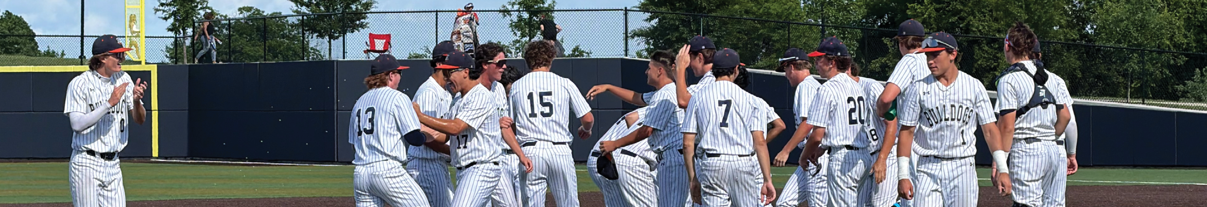 A group of baseball players hugging each other on the field. Contenido generado con IA