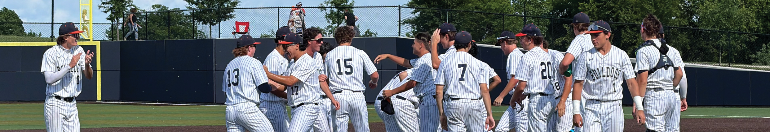 A group of baseball players hugging each other on the field. Contenido generado con IA