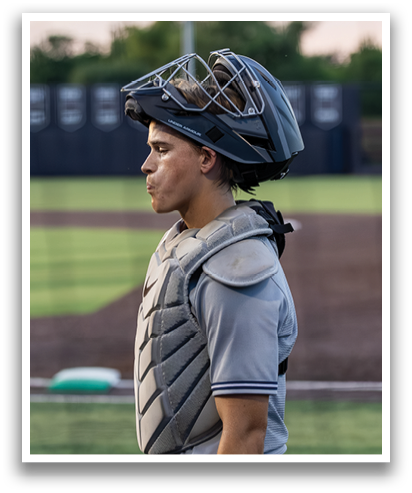 Two baseball players wearing grey uniforms and holding baseball gloves. Contenido generado con IA