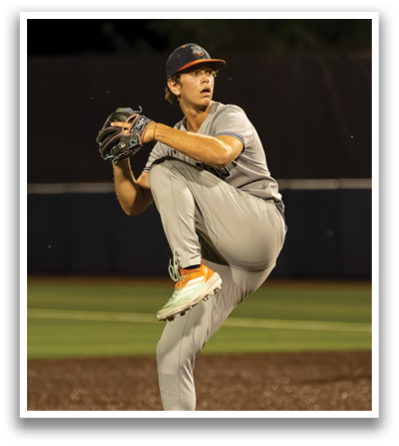 A baseball player in a grey uniform is pitching a ball on a field. Contenido generado con IA