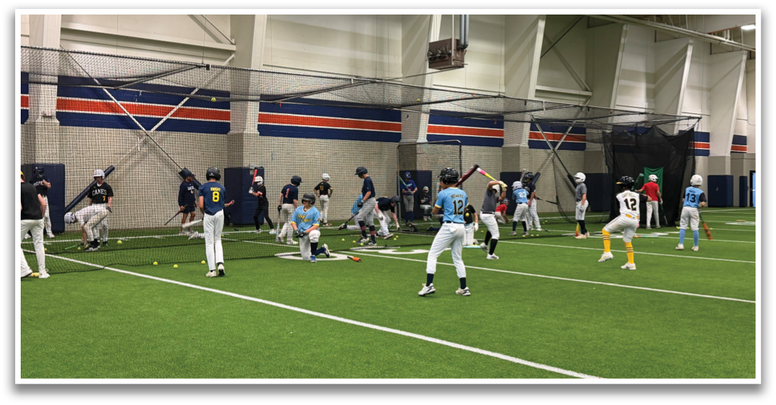 A group of people are practicing baseball in a gym. Contenido generado con IA