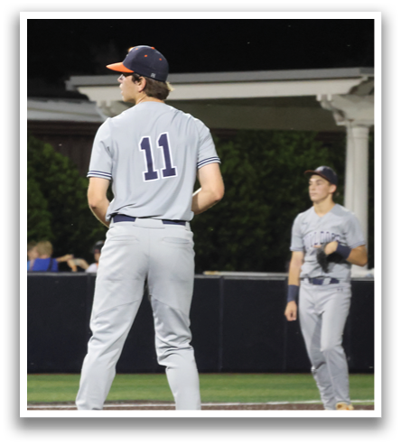 Two baseball players are standing on the field, one of them wearing a number 11 jersey. Contenido generado con IA