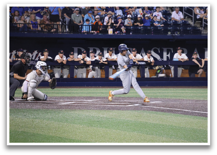 A baseball player is swinging a bat at a ball during a game. Contenido generado con IA