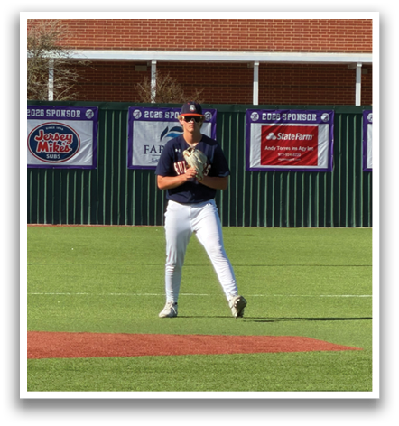 A baseball player in a blue and white uniform is standing on a field, holding a baseball in his hand. Contenido generado con IA
