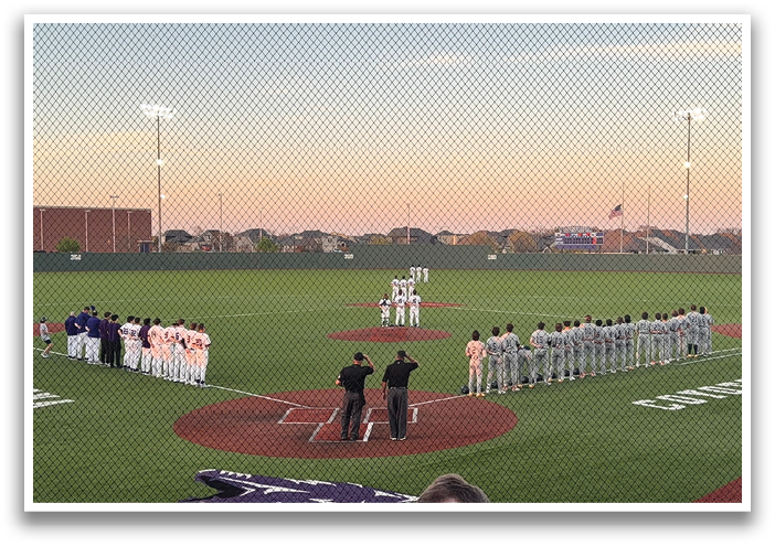 A group of people are standing on a baseball field, some of them wearing uniforms. Contenido generado con IA