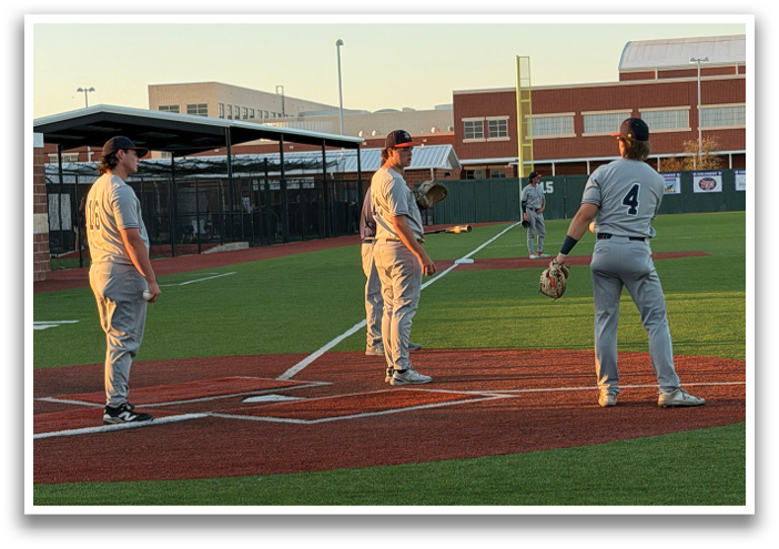 Three men are standing on a baseball field, with one of them holding a bat. Contenido generado con IA