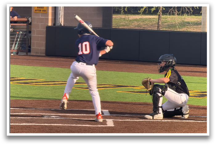 A baseball player is getting ready to hit a ball. Contenido generado con IA