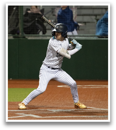 A baseball player is swinging a bat on a field. Contenido generado con IA
