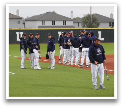 A group of baseball players on a field, some of them wearing blue and white uniforms. Contenido generado con IA