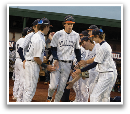 A group of baseball players are hugging each other on the field. Contenido generado con IA