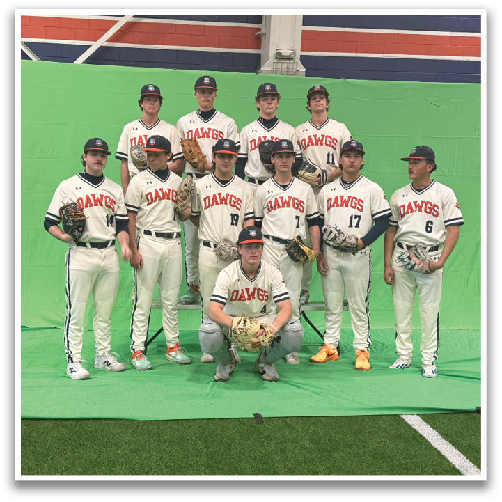 A group of young men in uniform pose for a picture on a field. Contenido generado con IA